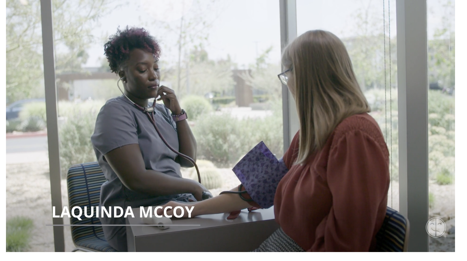 LaQuinda, a transplant nurse, interacts with a patient.